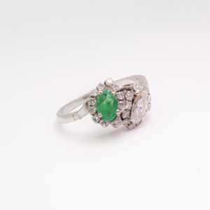 Anell d'or blanc 18K "Tu i jo" amb maragdes i diamants