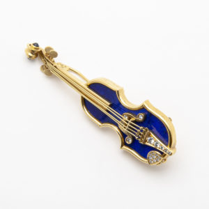 18K yellow gold “Violin” brooch with lapis lazuli, diamonds and sapphires