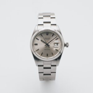 Rellotge de polsera Rolex Oysterdate Precision amb corretja metàl·lica, esfera rodona clara, índexs i agulles platejades i finestreta de data que indica el 13, fotografiat sobre fons blanc llis. Joieria Vintage Barcelona
