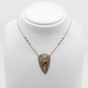 Rutilated quartz pendant, diamonds and 14k rose gold.